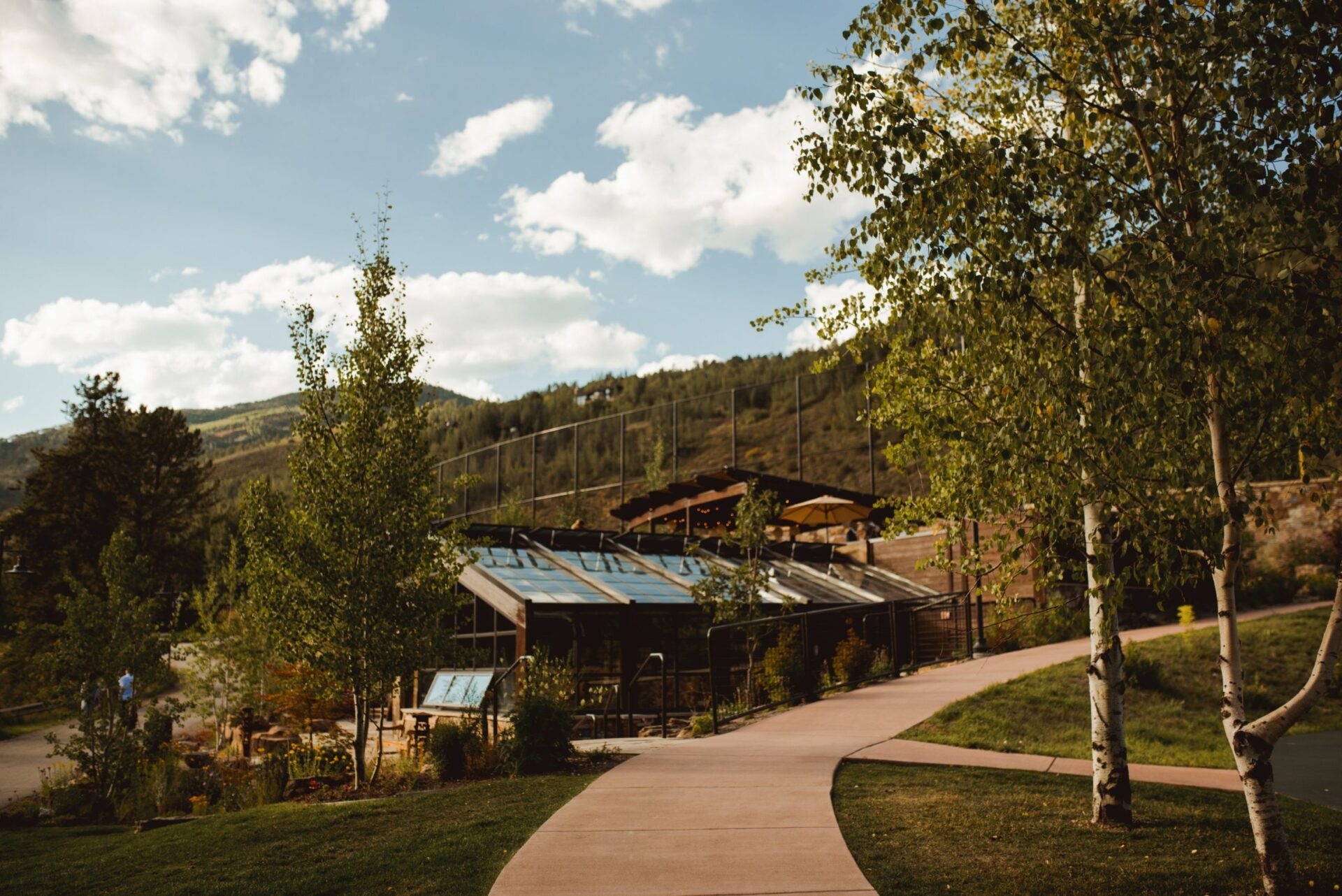 Betty Ford Alpine Gardens Education Center with Mountains Behind