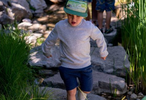 Child on Stepping Stones in Children's Garden at Betty Ford Alpine Gardens